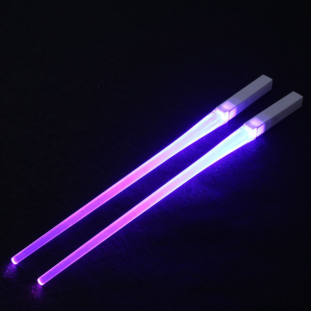 Pair of glowing chopsticks, featuring a sleek design with LED lights embedded in the handles, illuminating the entire length. Perfect for a fun, unique dining experience or themed events. Available in various colors, adding a vibrant touch to your sushi or asian meal.